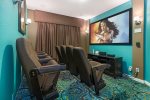 The ground floor also a private theater room with a 92-inch projection screen 